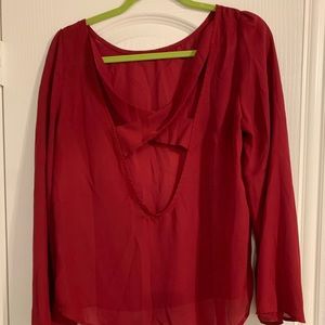 Burgundy/wine color chiffon backless blouse with cross cross back.